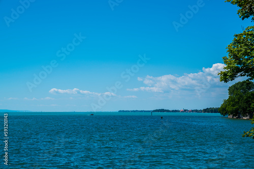 Obraz na płótnie Germany, Beautiful panorama view bodensee blue lake water coast from lindau, sailboats lake sunny day vacation mood w salonie