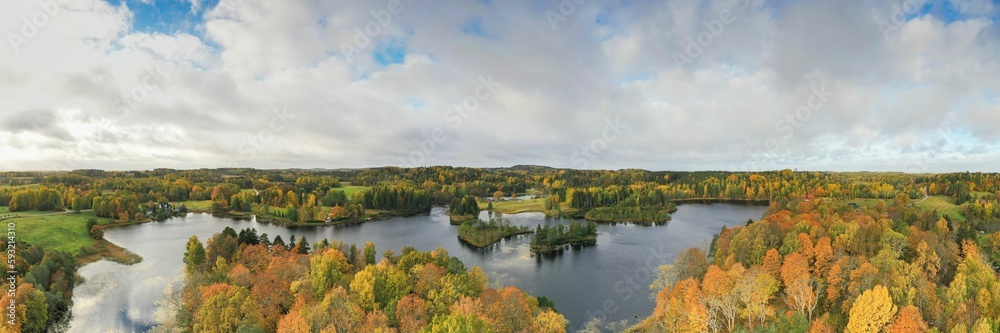 Panorama view of a beautiful lake near the forest in Voru, Estonia