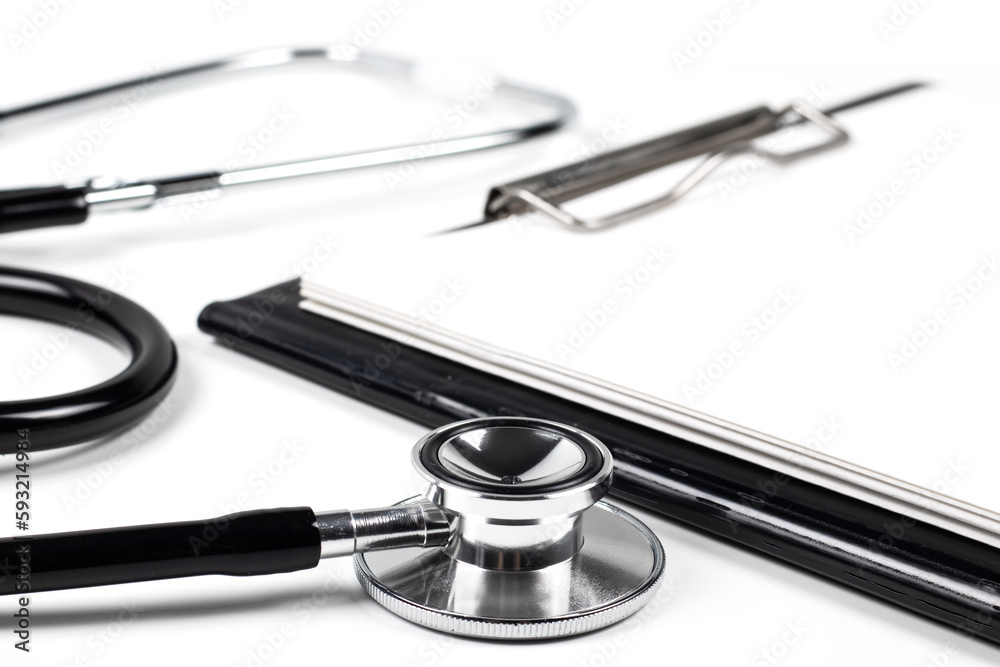 Stethoscope laying on patient information blank. Stethoscope laying on patient information blank.