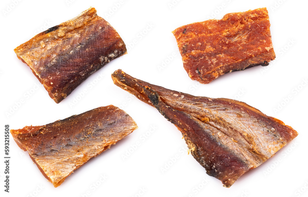 Pieces of cleaned dried fish isolated on white. Dry Peppered Pollack. Amber with pepper Collection