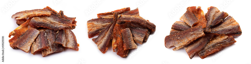 Pieces of cleaned dried fish isolated on white. Dry Peppered Pollack. Amber with pepper Collection