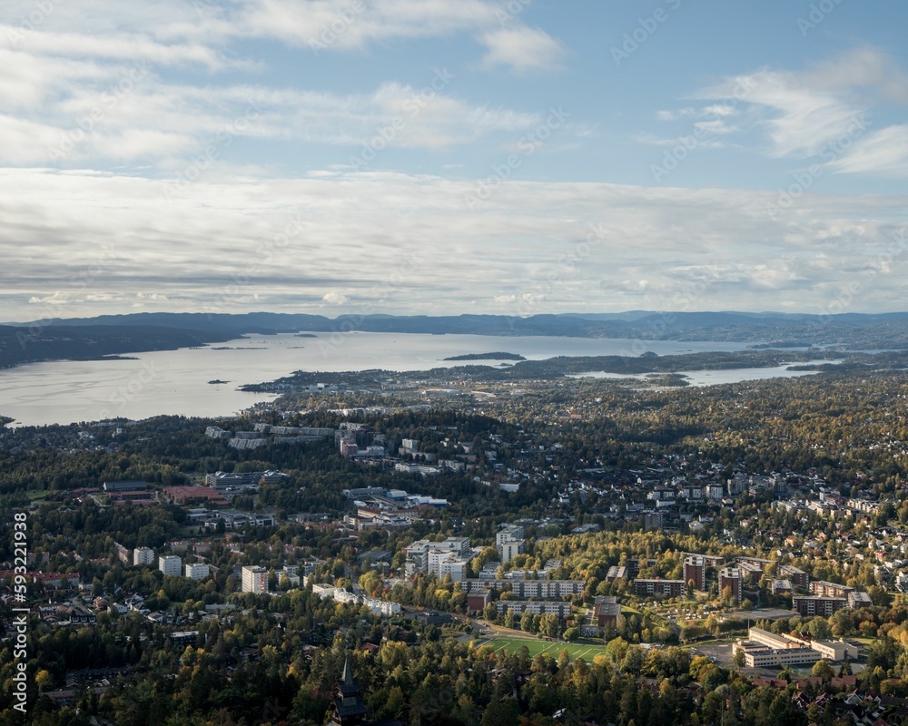Aerial view of the cityscape with a cloudy sky in the background, Oslo, Norway