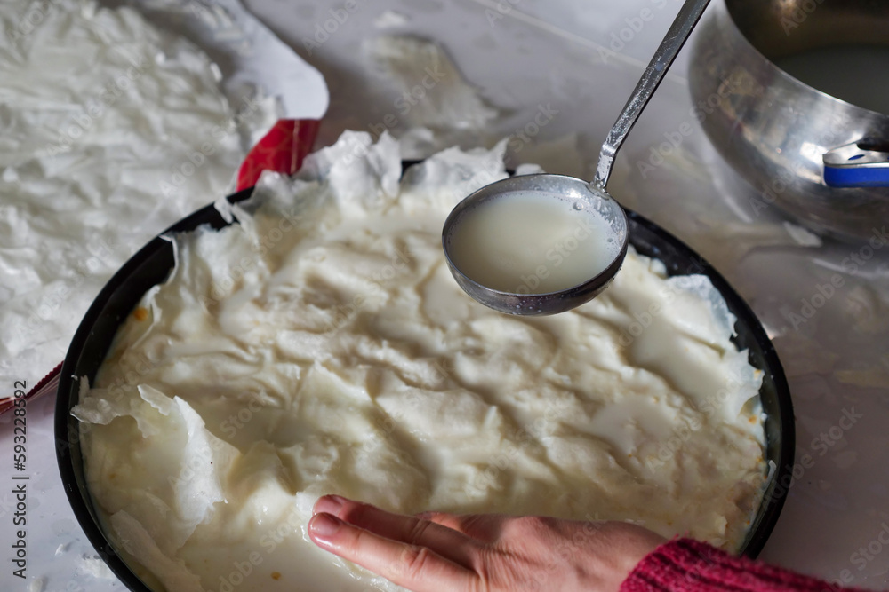 Turkish Dessert Güllaç, A Woman Making Güllaç Dessert,Turkish Dessert Made in Ramadan, Güllaç with Milk,