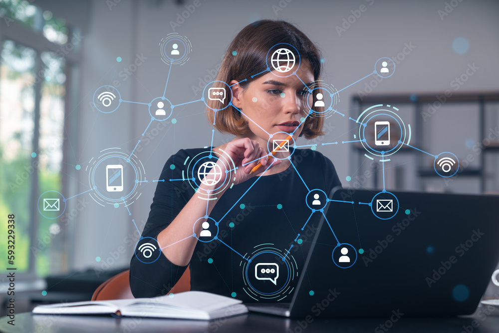 Φωτογραφία Pensive attractive beautiful businesswoman in formal wear working on laptop at office workplace in background