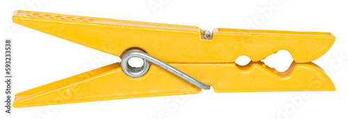 Yellow plastic clothes peg isolated on transparent background photo