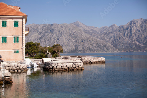 Sea, mountain, boat. Spring landscape. Montenegro, Kotor Bay view.