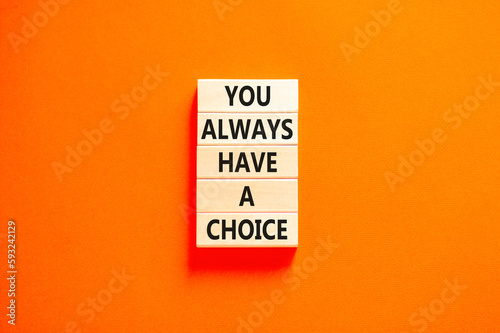 You always have choice symbol. Concept words You always have a choice on wooden block. Beautiful orange table orange background. Business you always have choice concept. Copy space.