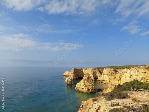 View on the dramatic cliffs of the coast of Algarve in Portugal