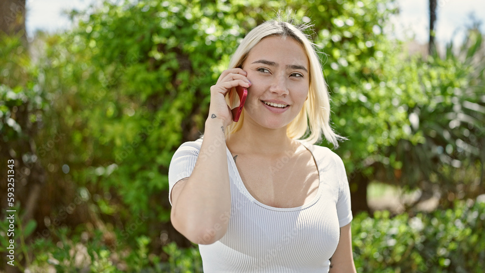 Young beautiful hispanic woman smiling confident talking on the smartphone at park Young beautiful hispanic woman smiling confident talking on the smartphone at park