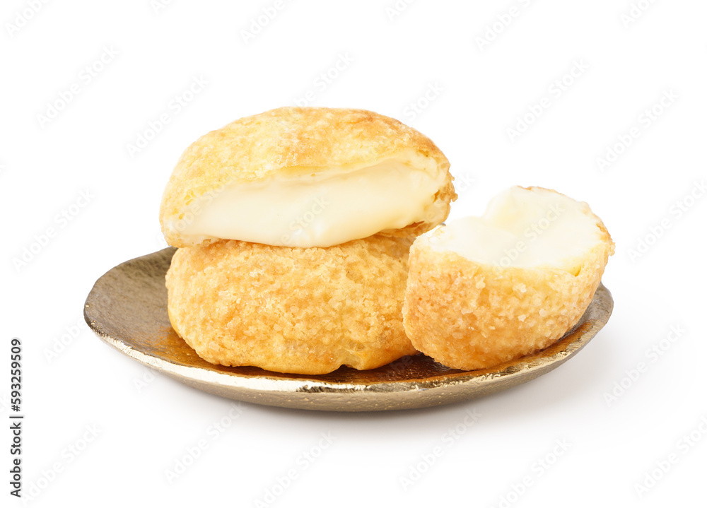Plate with delicious choux pastry on white background Plate with delicious choux pastry on white background