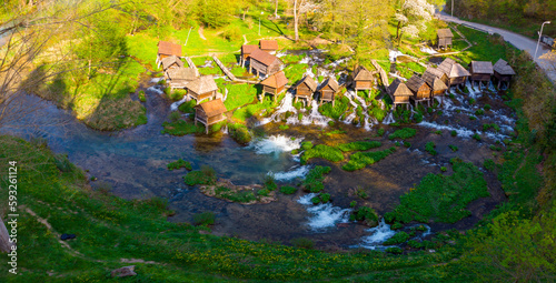 Fototapeta Naklejka Na Ścianę i Meble -  Wooden watermills in Jajce were used by local farmers. Aerial view