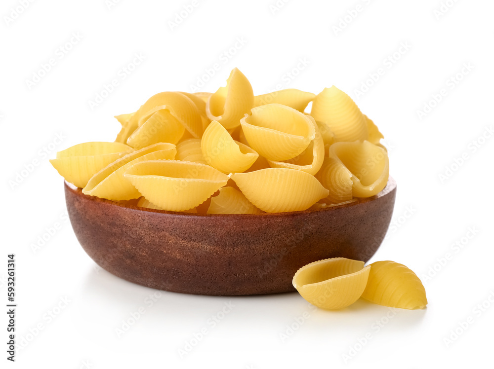 Bowl of raw conchiglie pasta isolated on white background Bowl of raw conchiglie pasta isolated on white background
