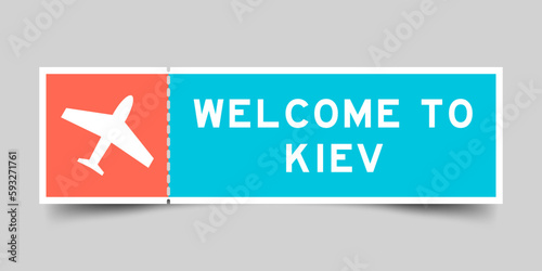 Orange and blue color ticket with plane icon and word welcome to kiev on gray background