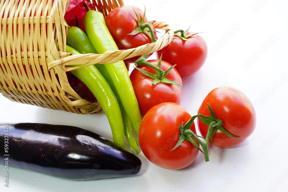 fresh vegetables in basket on white background fresh vegetables in basket on white background