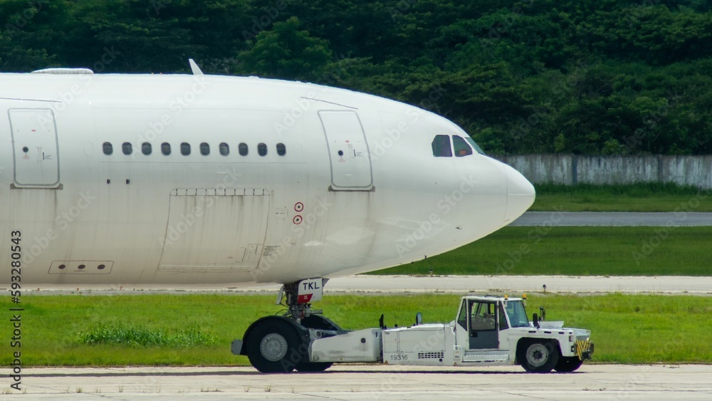 Pushbacj to an aircraft Pushbacj to an aircraft