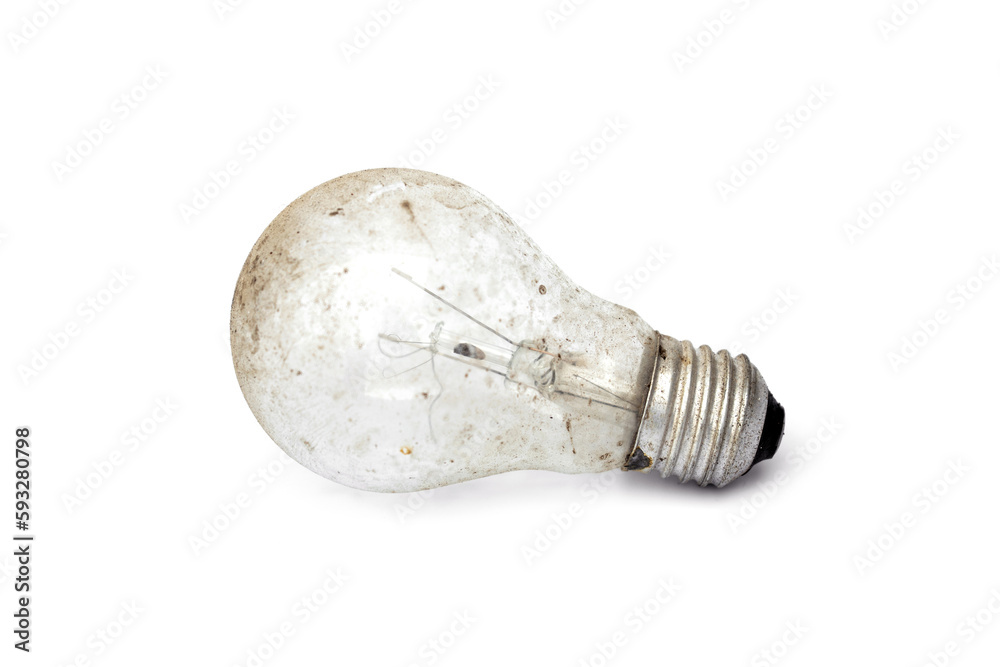 Old and dusty light incandescent bulb isolated on white background. Old and dusty light incandescent bulb isolated on white background.