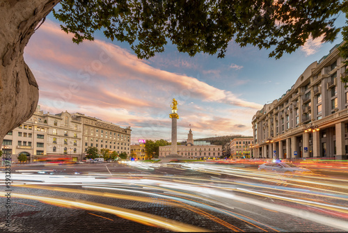 View of Freedom Square, Tbilisi, Georgia with movement of car light during twilight