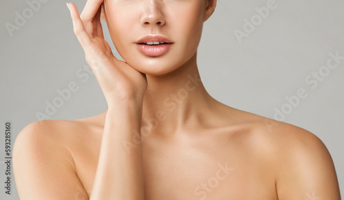 Wallpaper Mural Beauty Lips Close up. Beautiful Girl Plump Mouth with Natural Makeup. Young Woman massaging Face over White Background. Women Dermal Filler Cosmetology and Plastic Surgery Torontodigital.ca