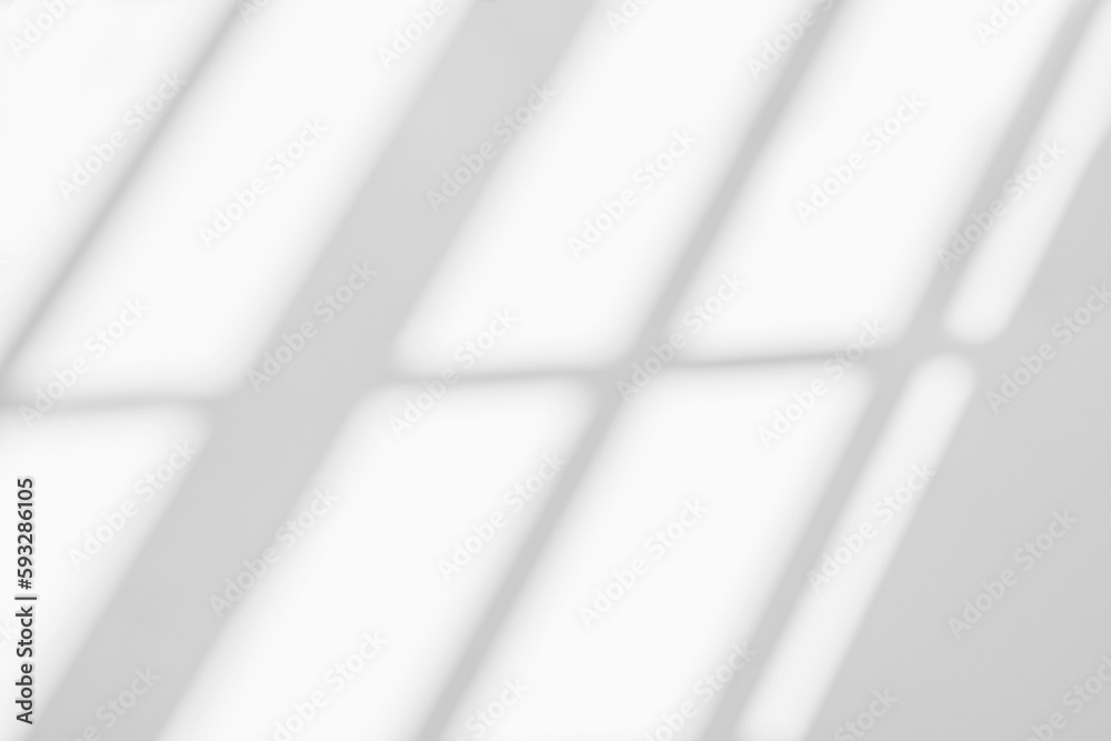 Abstract light reflection and grey shadow from window on white wall background, dark gray shadows and sunshine overlay effect for backdrop and mockup design Abstract light reflection and grey shadow from window on white wall background, dark gray shadows and sunshine overlay effect for backdrop and mockup design