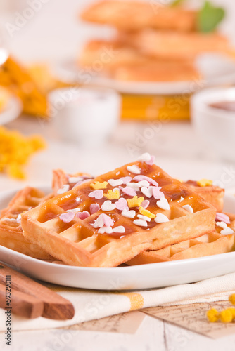 Waffles with jam and confetti. 