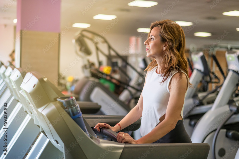 Young Woman Workout In Gym Healthy Lifestyle. Copy Space Young Woman Workout In Gym Healthy Lifestyle. Copy Space