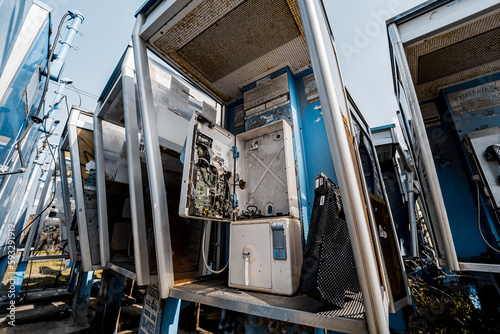 Old and dirty street phones at the city landfill