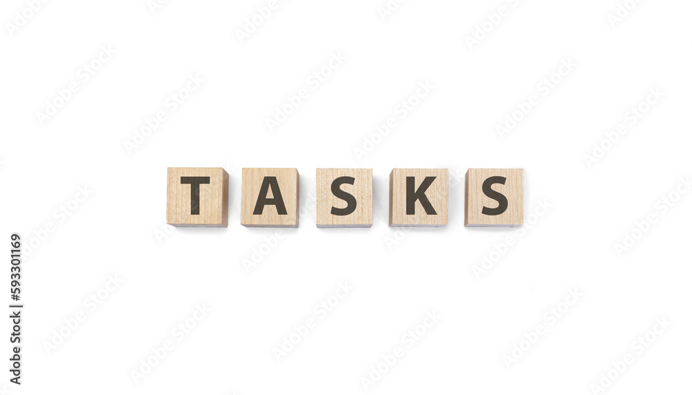 tasks word on wooden cubes on a white background tasks word on wooden cubes on a white background