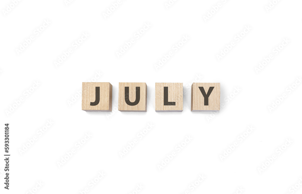 july word on wooden cubes on a white background july word on wooden cubes on a white background
