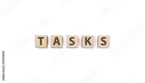 tasks word on wooden cubes on a white background