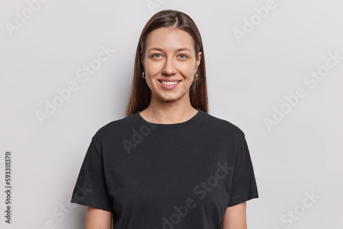 Fotografija Portrait of good looking young woman with no makeup natural beauty has long dark