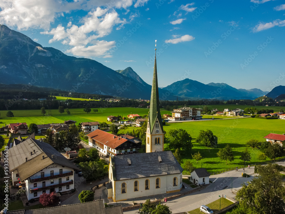 Aerial view Alpbach town in, Tirol. Austria by drone. Alps mountains.