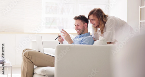 Portrait Of Couple Doing Home Finance