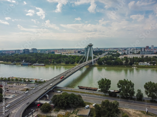 Aerial vIew by drone. Summer. Bratislava, Presburg. Slovakia. Bridge on Danube river.