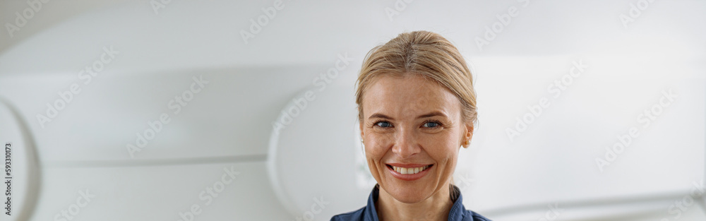 Doctor radiologist on background of MRI or CT Scan with patient. High-Tech medical equipment Doctor radiologist on background of MRI or CT Scan with patient. High-Tech medical equipment