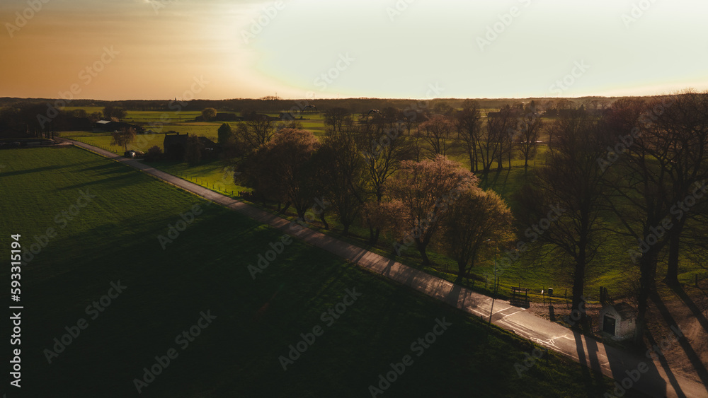sunset over Dutch fields, drone shot