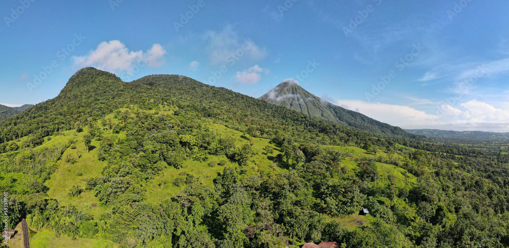 Fototapeta premium Landscape Panorama picture from Volcano Arenal next to the rainforest. 