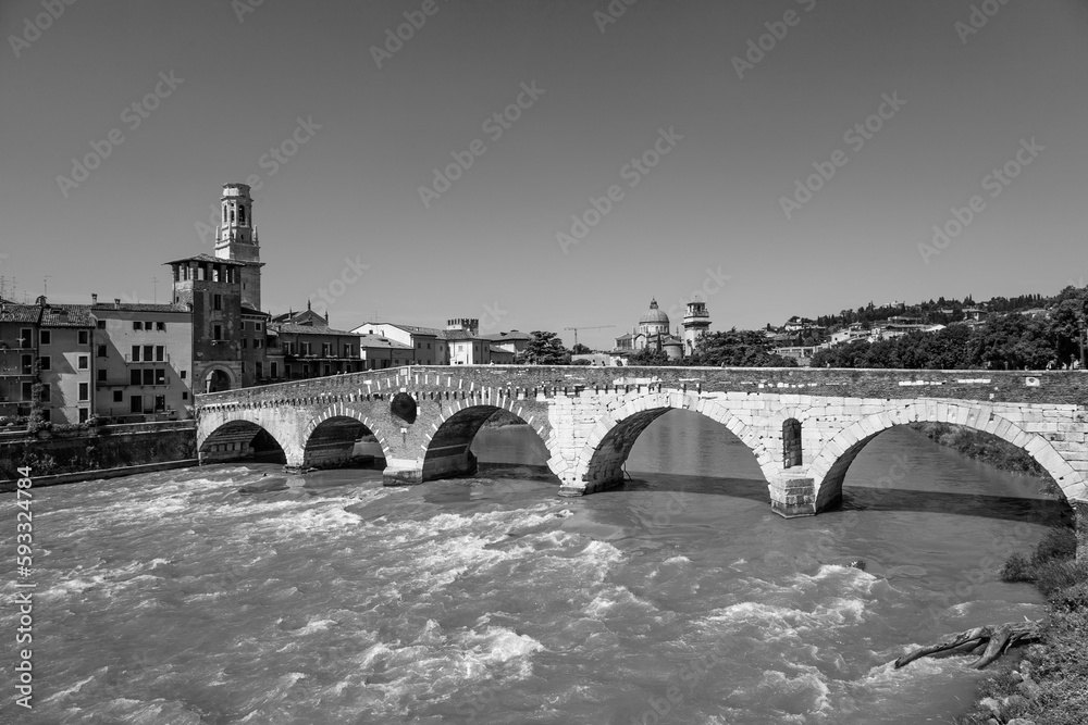 the old roman bridge in Verona  spans the river Etsch