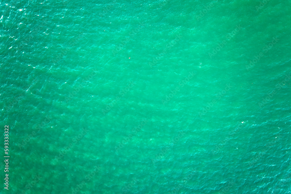 Aerial view of seascape surface of green sea water with small ripple waves