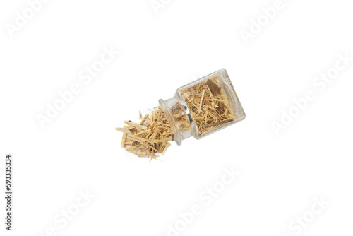  siberian ginseng in latin Eleutherococcus senticosus falling out of a glass jar isolated on white background. Medicinal herb. has a history of use in folklore and traditional Chinese medicine. 