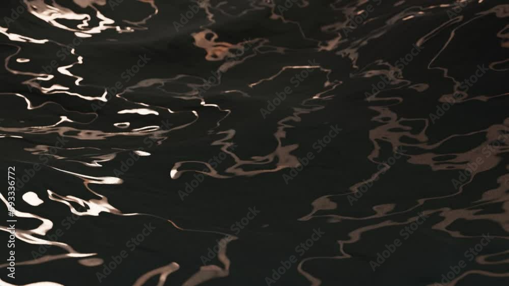 3d realistic render of marbled terrain animated texture. Smoothly moving golden waves on a black grainy surface. Slow movement with a bokeh effect backdrop. Art Deco style curvy landscape 3d realistic render of marbled terrain animated texture. Smoothly moving golden waves on a black grainy surface. Slow movement with a bokeh effect backdrop. Art Deco style curvy landscape