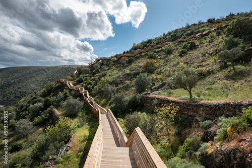 Entre montes , os Passadiços do Côa, estrutura em madeira com o cumprimento de 930 metros de extensão e 890 degraus em Foz Côa, Portugal photo