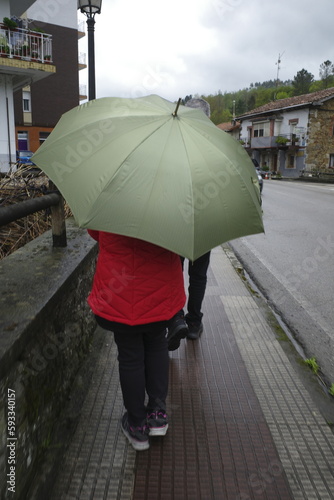person under umbrella © Laiotz