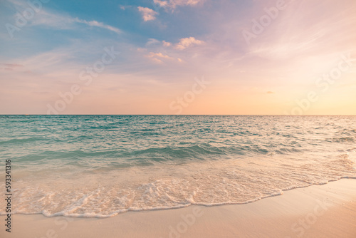 Orange golden sunset sunrise sky calm tranquil relaxing sunlight summer. Closeup sea sand beach. Panoramic beach landscape. Inspire tropical seascape waves horizon. Peaceful nature Mediterranean view  © icemanphotos