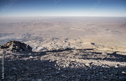 Panoramic view at sunset from the slope of Mount Ararat to the hills and rocks below, mountain landscape in the evening at sunset