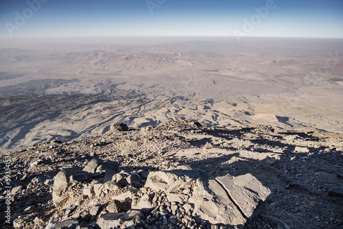 Panoramic view at sunset from the slope of Mount Ararat to the hills and rocks below, mountain landscape in the evening at sunset