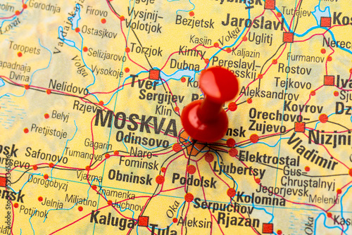 Red map pin on a map of Moscow.