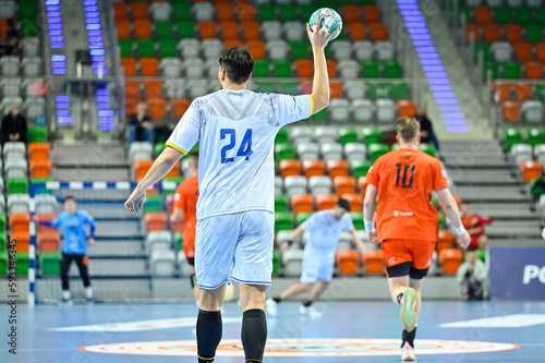 Obraz na płótnie Handball player with ball during handball match. w salonie