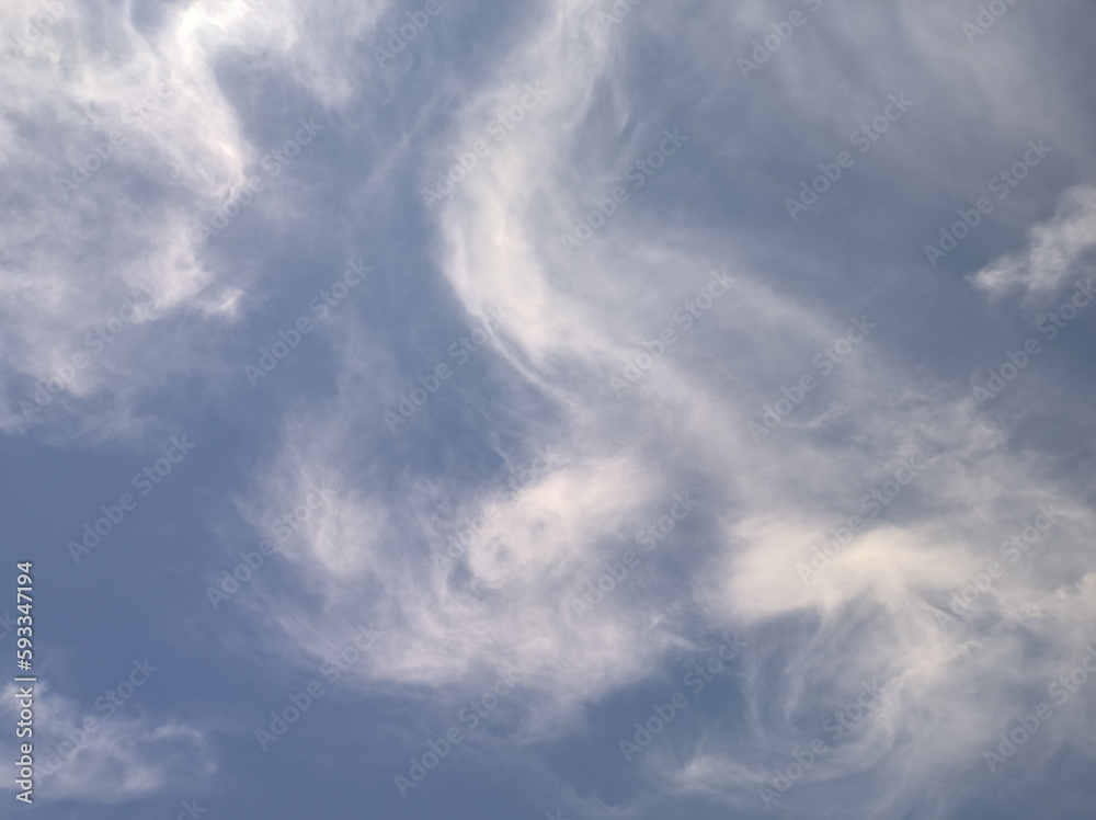 Diffuse clouds forming spirals