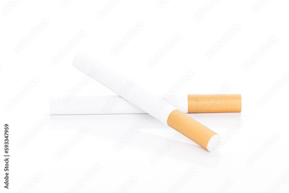 Close up of a smoking cigarettes on white background, Cigarette, tobacco in roll paper with filter tube Close up of a smoking cigarettes on white background, Cigarette, tobacco in roll paper with filter tube