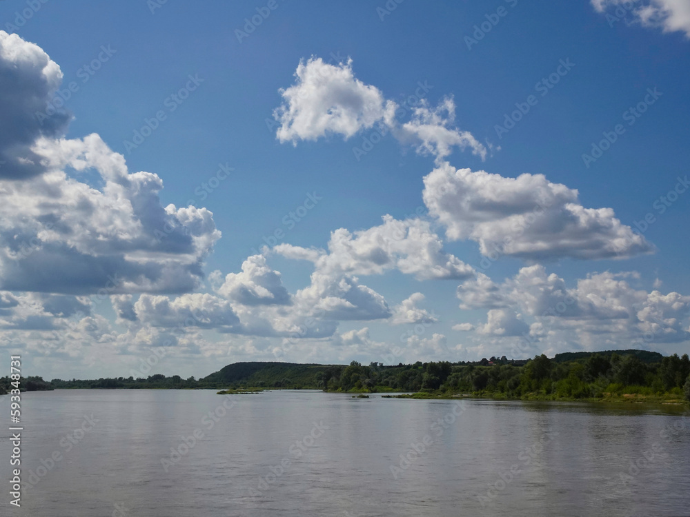 View of the bank of the Vistula River near Kazimierz Dolny on a sunny summer day, Kazimierz Dolny, Poland